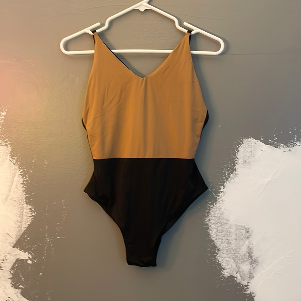 women’s size small, one piece